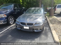 BMW 5 Series delivered to Tewksbury, Massachusetts - car shipping from Houston, Texas
