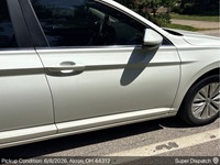 Volkswagen Jetta auto transport pickup in Akron, Ohio before shipping to Visalia, California