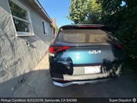 Kia Sportage Hybrid auto transport pickup in Sunnyvale, California before shipping to Ypsilanti, Michigan