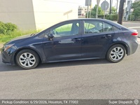 Toyota Corolla auto transport pickup in Houston, Texas before shipping to Framingham, Massachusetts