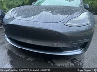 Tesla Model 3 auto transport pickup in Holmdel, New Jersey before shipping to Atlanta, Georgia