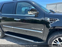 Cadillac Escalade auto transport pickup in New Port Richey, Florida before shipping to Concord, California