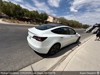 Tesla Model 3 auto transport pickup in Las Vegas, Nevada before shipping to Frisco, Texas