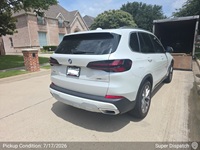 BMW X5 auto transport pickup in Plano, Texas before shipping to San Jose, California