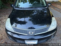 Nissan Versa auto transport pickup in Seattle, Washington before shipping to The Colony, Texas