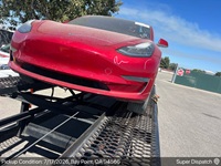 Tesla Model 3 auto transport pickup in Pittsburg, California before shipping to San Diego, California