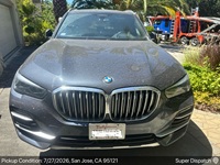 BMW X5 auto transport pickup in San Jose, California before shipping to Renton, Washington