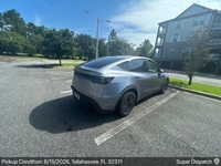 Tesla Model Y auto transport pickup in Tallahassee, Florida before shipping to Farmers Branch, Texas