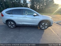 Honda CR-V auto transport pickup in Schenectady, New York before shipping to Seattle, Washington