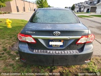 Toyota Corolla auto transport pickup in Hudsonville, Michigan before shipping to Greenville, South Carolina