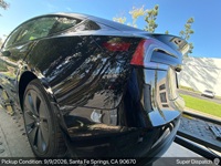 Tesla Model 3 auto transport pickup in Whittier, California before shipping to Chicago, Illinois