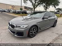 BMW 5 Series auto transport pickup in Aurora, Illinois before shipping to Chesapeake, Virginia