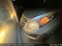 Chevrolet Spark EV auto transport pickup in San Jose, California before shipping to Reno, Nevada