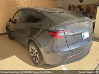 Tesla Model Y auto transport pickup in Poway, California before shipping to Mountain View, California