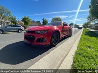 Chevrolet Camaro auto transport pickup in Patterson, California before shipping to null, 