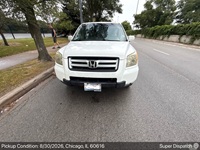 Honda Pilot auto transport pickup in Chicago, Illinois before shipping to Cerritos, California