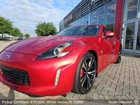 Nissan 370Z auto transport pickup in Winter Haven, Florida before shipping to San Francisco, California