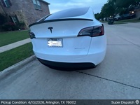 Tesla Model Y auto transport pickup in Arlington, Texas before shipping to Rosemead, California