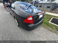 Ford Fusion auto transport pickup in Orlando, Florida before shipping to Mayfield Heights, Ohio